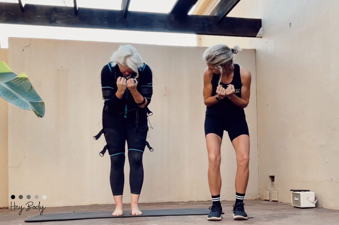 Two clients training together in an EMS session at home